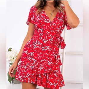 GORGEOUS red wrap patterned dress with ruffles.